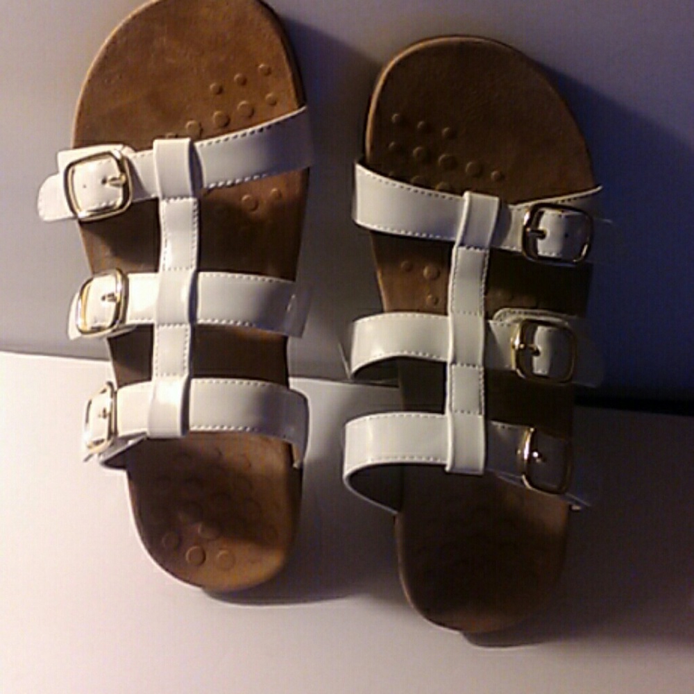 Used white sandals